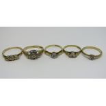 Five 9ct illusion set diamond rings, 7.7g total (5)