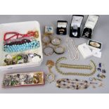 Mixed lot of costume jewellery to include a boxed Swarovski Crystal Memories rocking horse, a
