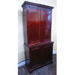A Georgian mahogany state office cabinet the lower section enclosed by two panelled doors fitted