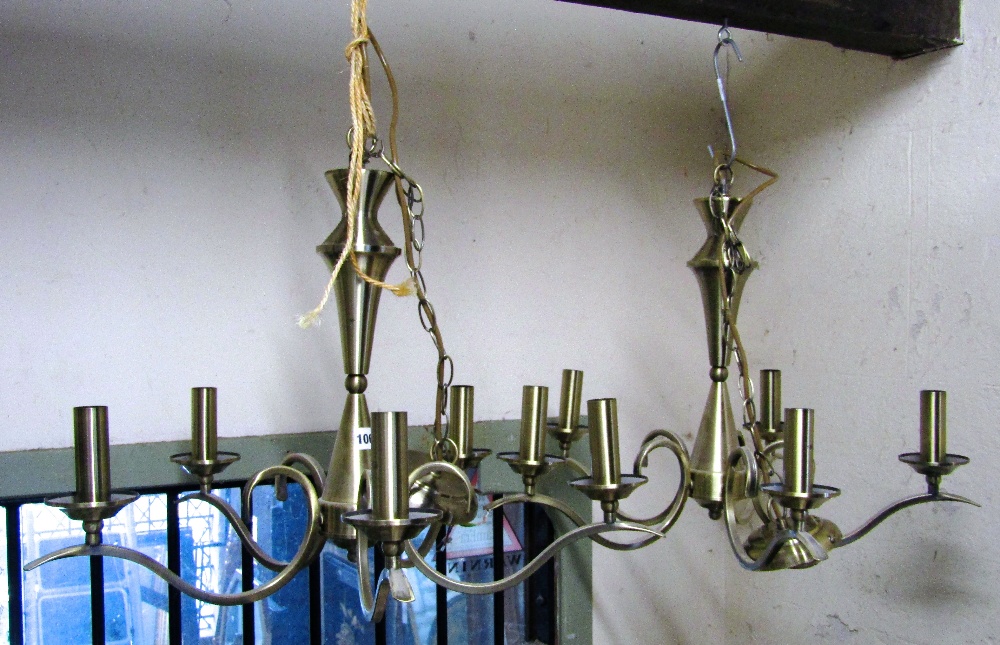 A pair of contemporary brushed steel hanging six branch electroliers, with cone shaped stems - Image 2 of 2