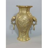 A good quality Chinese polished cast bronze, baluster twin handled vase, with twin elephant ring