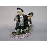 A 19th century pottery figure group of the Vicar and Moses/or the Drunken Vicar, possibly of