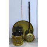 An arts and crafts style polished brass coal bucket, with lions mask and ring handles and galleon