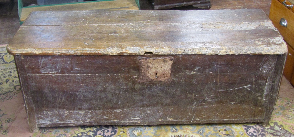 A substantial 18th century continental coffer in mixed woods, including walnut, with substantial