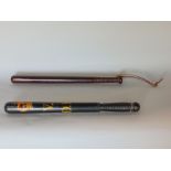 Antique cell police truncheon painted V.R D.P.C and a crown, 44 cm long together with a further