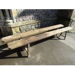 A pair of 19th century oak benches or forms raised on splay supports, 270 cm length x 47 cm in