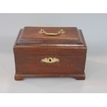 19th century mahogany sarcophagus caddy, the hinged lid enclosing a lead lined interior, 23cm wide