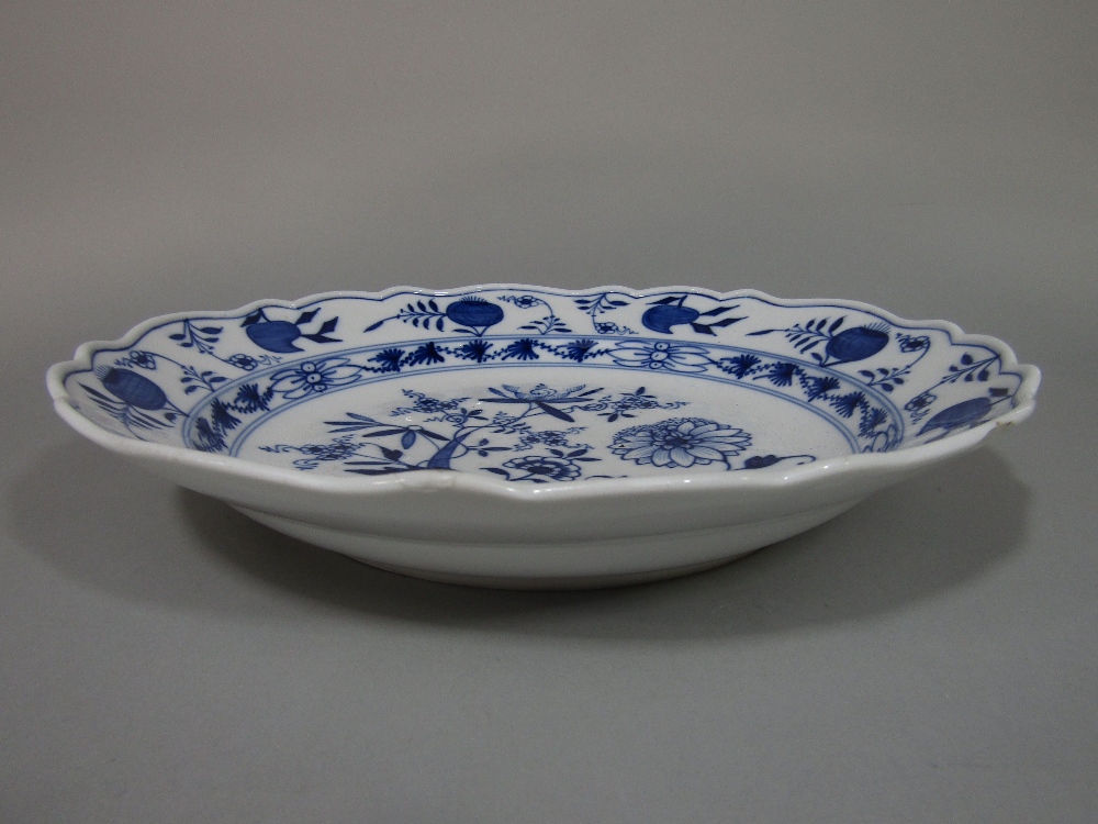 A 19th century Meissen type charger with blue and white painted floral decoration with blue cross - Image 2 of 2