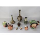 A collection of Royal Doulton ceramics including a vase with alternating Slaters type panels and