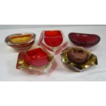 A collection of prismatic glass ashtrays together with two of organic form (5)