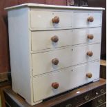 A Victorian pine bedroom chest of two short over three long graduated drawers with later painted