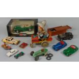 Collection of vintage toys including clockwork 'Rodeo Joe' by MFG Co (USA), clockwork cars by Schuco