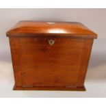 Victorian oak stationery or writing cabinet with segmented interior, the rising lid leather lined,