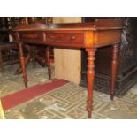 A 19th century mahogany side table, with shallow three quarter raised gallery, over two frieze