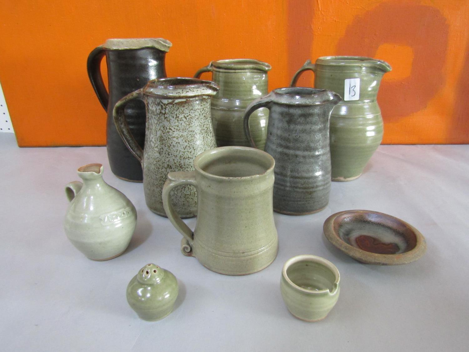 Probably Leach of St Ives - A collection of mainly celadon glazed studio pottery comprising five