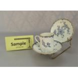 A collection of Royal Worcester Mansfield pattern coffee cans and saucers with blue printed floral