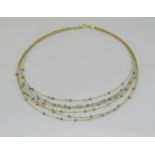 18ct bi-colour multi strand necklace set with diamonds, 16.1g