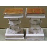 A pair of novel contemporary hardwood occasional tables in the form of a stack of books with painted