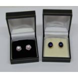 Two pairs of 9ct stud earrings; a cabochon lapis lazuli pair and a pearl and diamond pair (4)