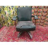 Vintage industrial/machinists desk chair, with green vinyl upholstery upon a cast aluminium four