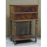 A small 19th century mahogany side table fitted with two frieze drawers on turned supports with