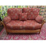 Ercol 'Renaissance' light elm three piece lounge suite, comprising two seat sofa and two armchairs