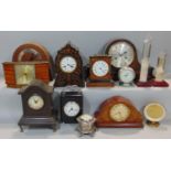 A large collection of various mantel clocks to include a twin train French inlaid example, two