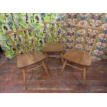 Set of three Ercol light elm comb back dining chairs