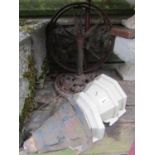 A pair of small iron implement wheels 46 cm in diameter, four reclaimed cast iron drain water
