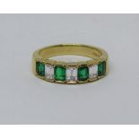 18ct emerald and diamond half hoop ring, size N/O, 5.5g