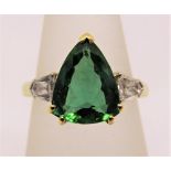 18ct pear cut green tourmaline and diamond ring, size O, maker T T, 5.6g