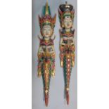 a pair of carved Thai timber figures with polychrome detail, 108cm high