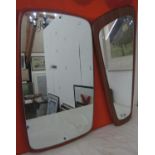 Two similar teak backed 1970s wall mirrors, 67 x 39cm and 66 x 32cm respectively (2)
