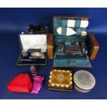 A cased silver part manicure set, a cased gentleman's travelling set fitted with glass and plated