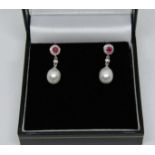 Pair of 18ct white gold ruby, diamond and cultured pearl drop earrings, 3.1g