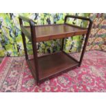 Danish solid rosewood two tier drinks trolley, with organic curved frame, possibly by Dyrland,