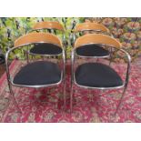 Effezeta - Set of four chairs with shaped beech back and black upholstered seats upon chrome frames,