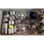 A mixed collection of silver comprising napkin rings, condiments, tea strainer, sardine fork etc,