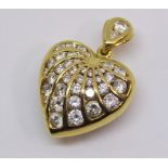 18ct heart shaped pendant set with graduated diamonds, 5.2g