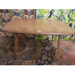 Ercol light elm rectangular coffee table upon spindle legs, 44cm high x 70cm long