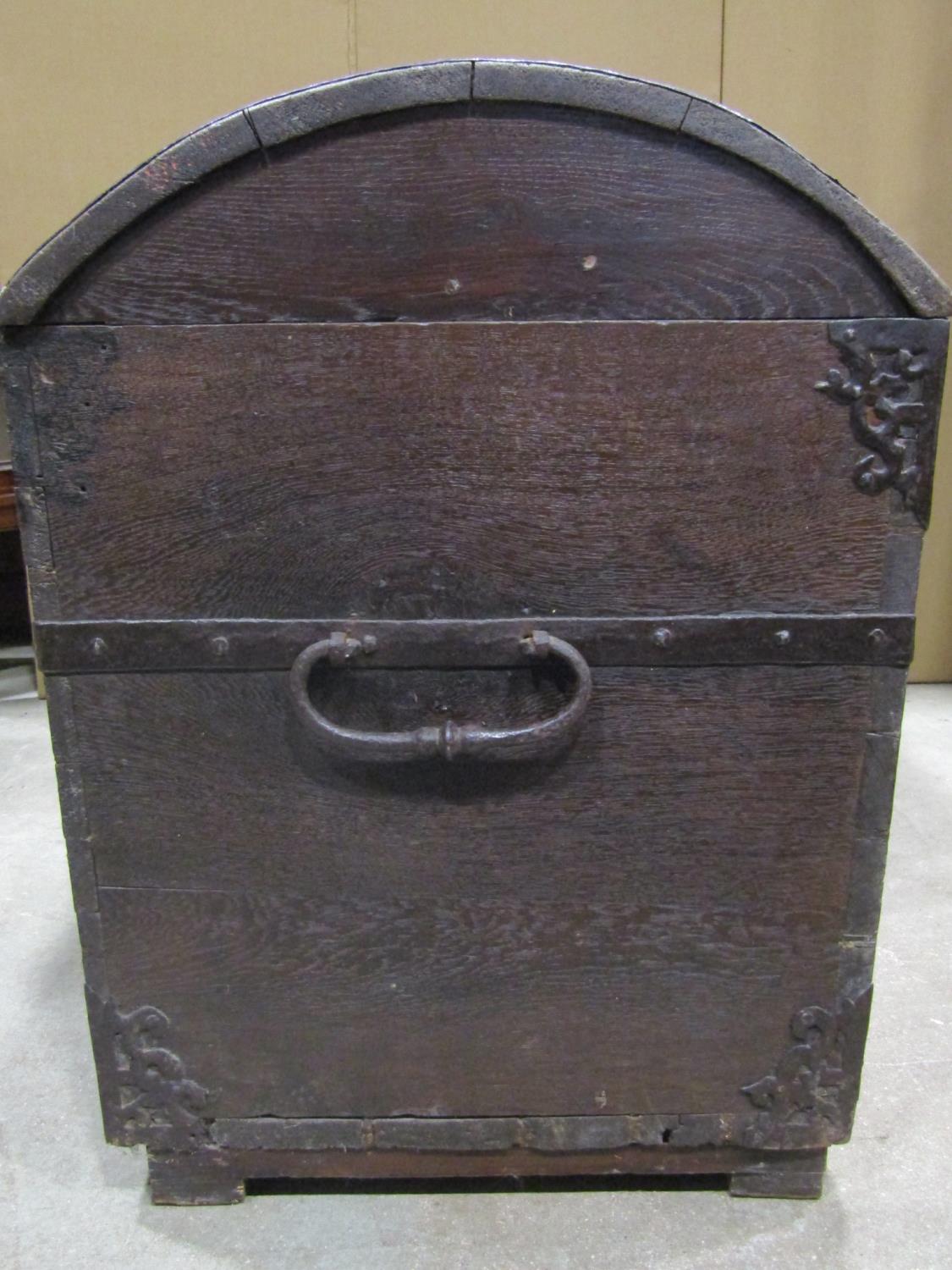 An 18th century oak domed top trunk/coffer with exposed strap work hinges, lasps and fittings and - Image 3 of 4