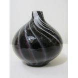 An unusual amethyst type glass ovoid vase, with latticino white streaks, 12cm high