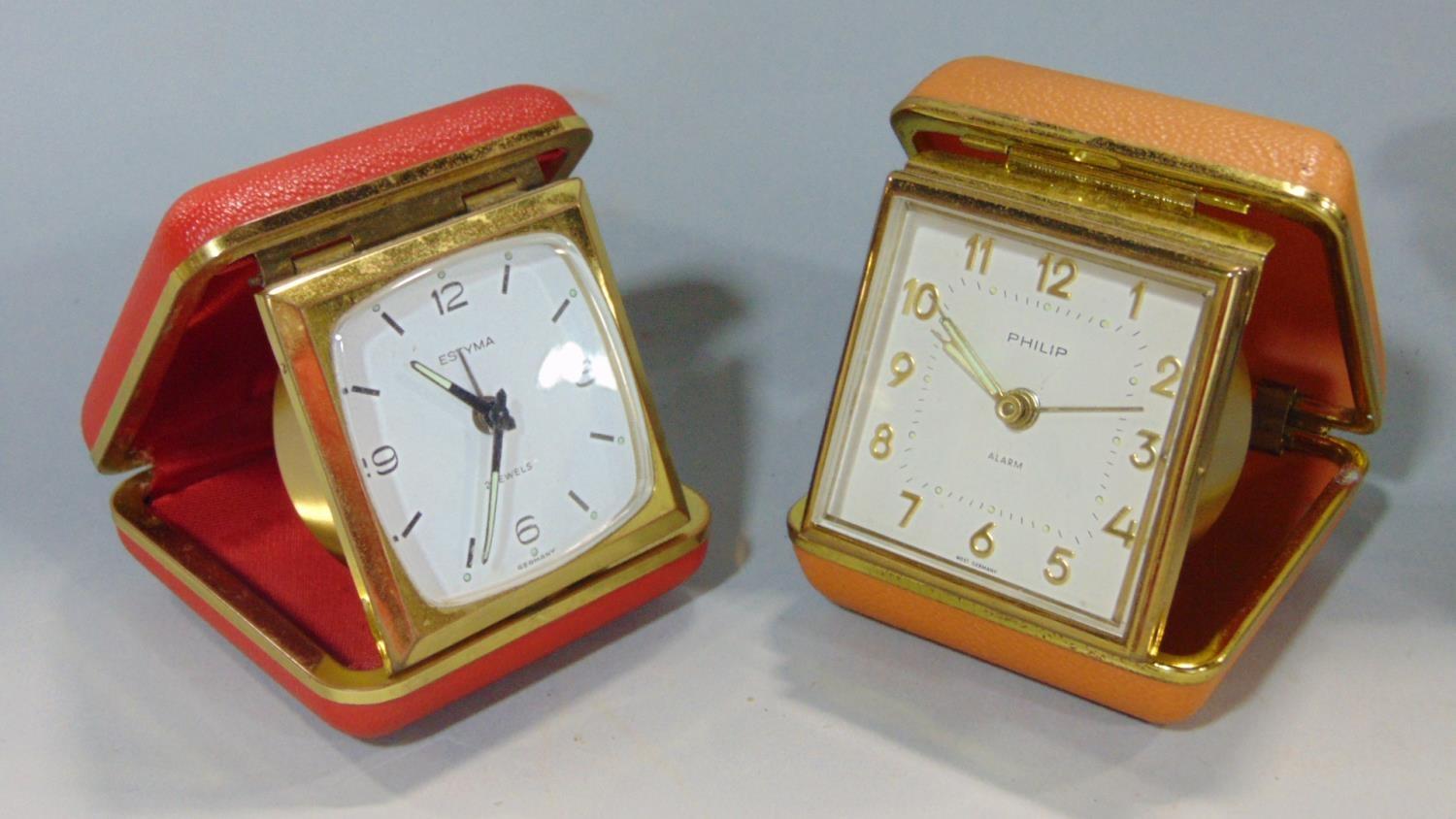 A collection of eleven various leather cased folding travel alarm clocks by HAC, Westclox and others - Image 2 of 3