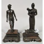 A pair of Burmese bronze figures, mother and child and a labourer, both raised on carved square