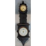 Black Forset type ebonised wall clock/barometer, 69cm high (af)