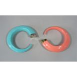 Two silver mounted 'tusk' bangles by Shaun Leane in simulated turquoise / coral resin (2)