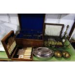 An oak canteen containing a quantity of silver plated flatware, the canteen marked Army & Navy CSL