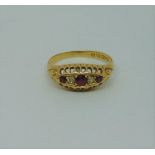 18ct ruby and diamond gypsy ring, size P, 2.8g