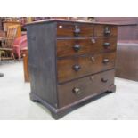 An 18th century mahogany and stained sided chest of three long and two short drawers on shallow