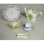 A collection of Portuguese blue and white printed dinner and teawares with floral detail including